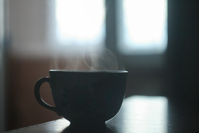 A cup with hot steam coming out of it