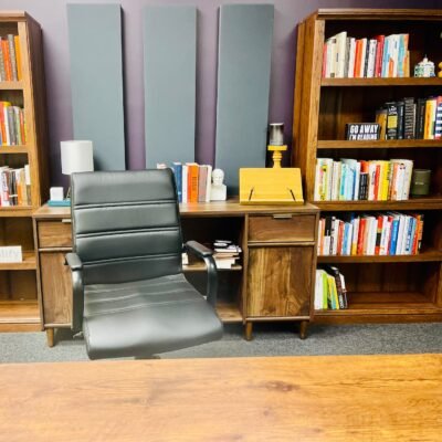 An empty chair in a reading room