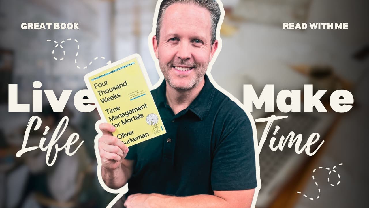 Eddy Hood holding a book titled Four Thousand Weeks: Time Management for Mortals